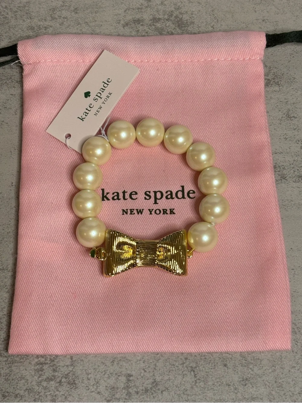 Kate Spade All Wrapped Up Faux Pearl Bracelet with Gold Bow Closure
